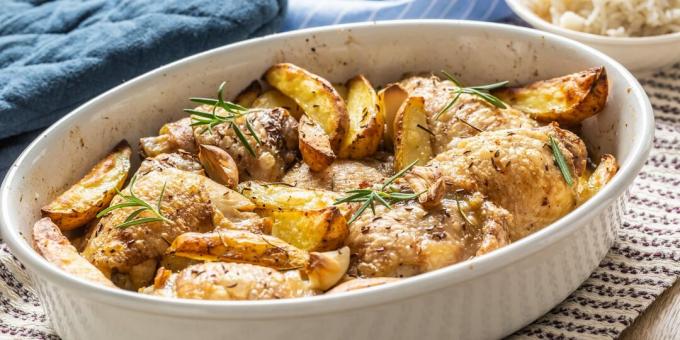 Huhn mit Kartoffeln und Gewürzen im Ofen